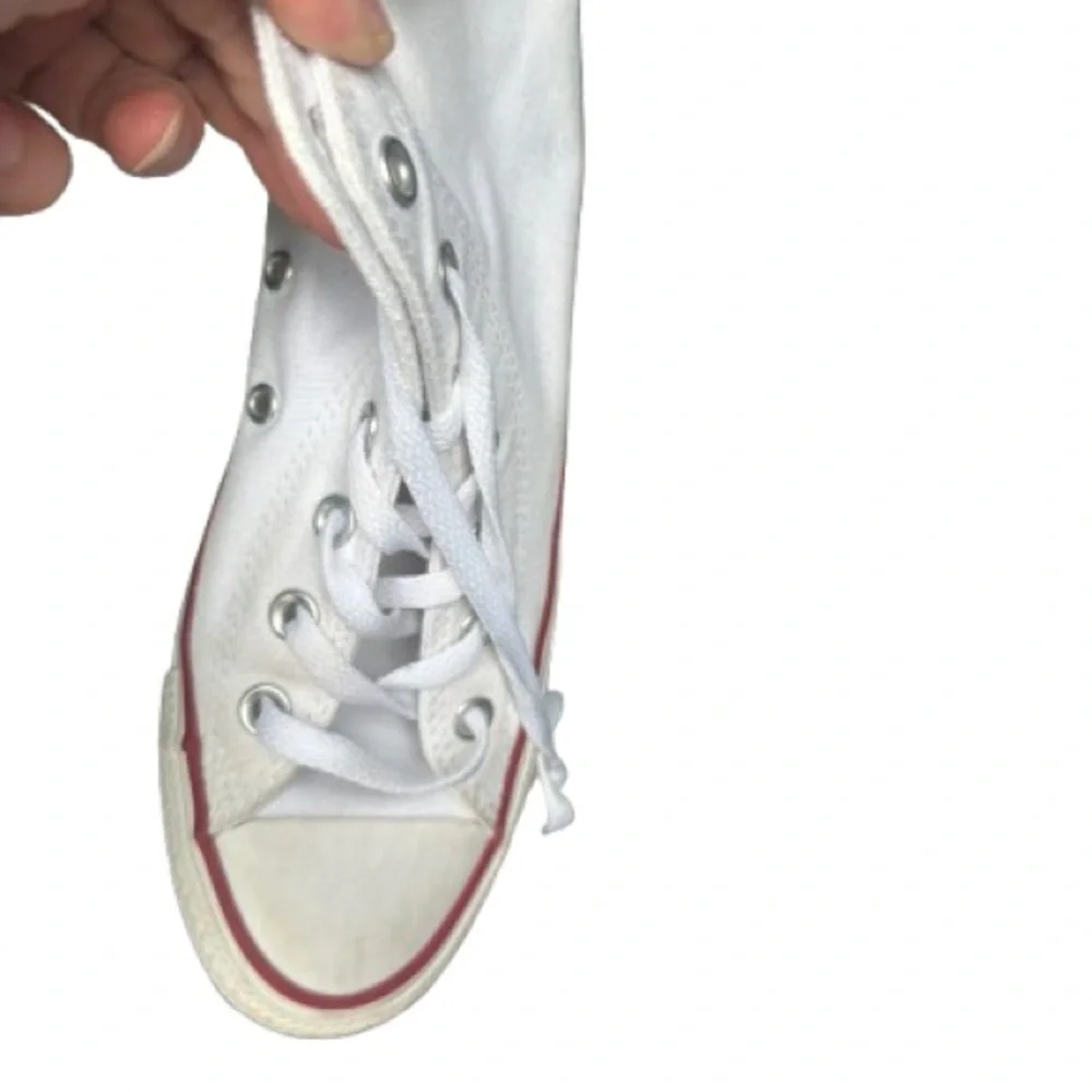 White Converse Chuck Taylor All Star high top sneakers